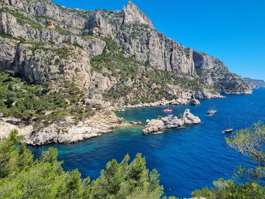 Explore the breathtaking cliffs and azure waters of Calanques National Park in Marseille, France.