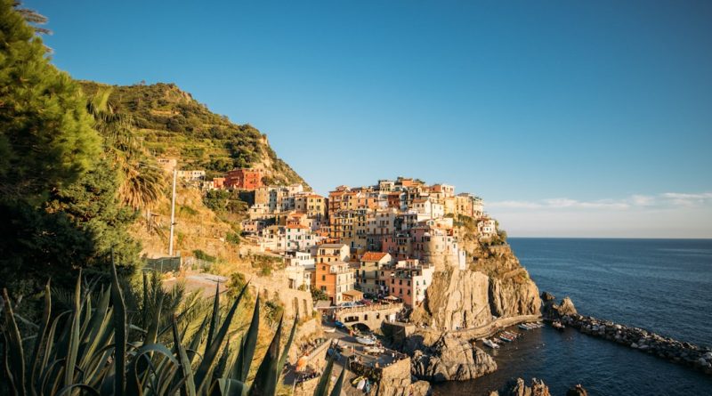 Picturesque italian village perched on cliffs above the ocean.