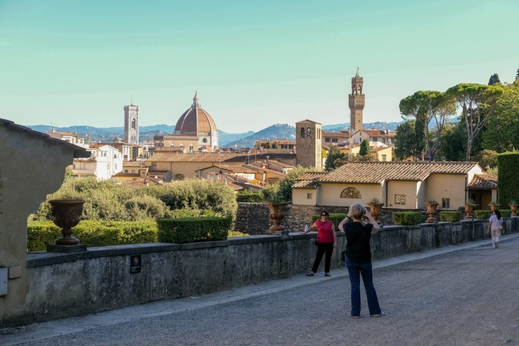Florence cityscape with duomo and people walking